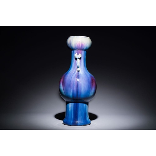 153 - A Chinese flambe-glazed garlic-mouth vase with ruyi handles, 19th C.H.: 57 cm
 Provenance: The colle... 