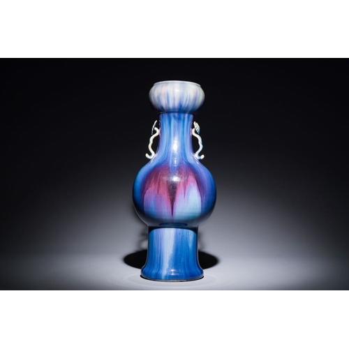 153 - A Chinese flambe-glazed garlic-mouth vase with ruyi handles, 19th C.H.: 57 cm
 Provenance: The colle... 