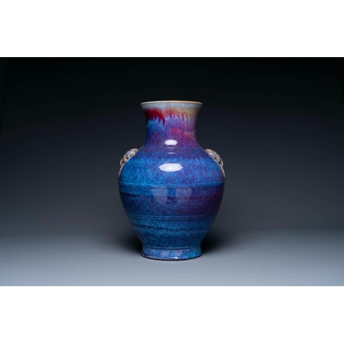 158 - A large Chinese flambe glaze 'hu' vase with taotie handles, QingH.: 53 cm