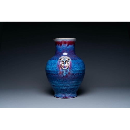158 - A large Chinese flambe glaze 'hu' vase with taotie handles, QingH.: 53 cm