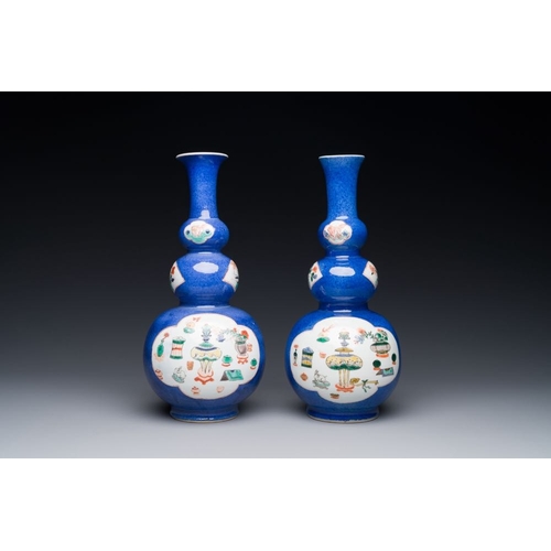 162 - A pair of Chinese famille verte powder-blue-ground triple gourd 'antiquities' vases, KangxiH.: 27,3 ... 