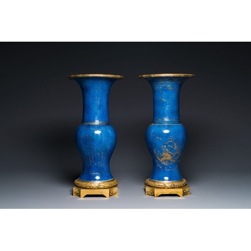 163 - A pair of Chinese gilt-decorated powder-blue 'yenyen' vases with gilt bronze mounts, KangxiH.: 51,5 ... 