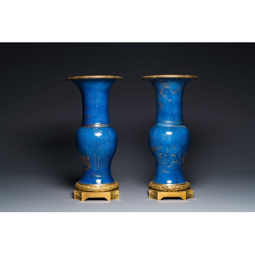 163 - A pair of Chinese gilt-decorated powder-blue 'yenyen' vases with gilt bronze mounts, KangxiH.: 51,5 ... 