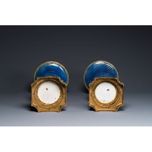163 - A pair of Chinese gilt-decorated powder-blue 'yenyen' vases with gilt bronze mounts, KangxiH.: 51,5 ... 