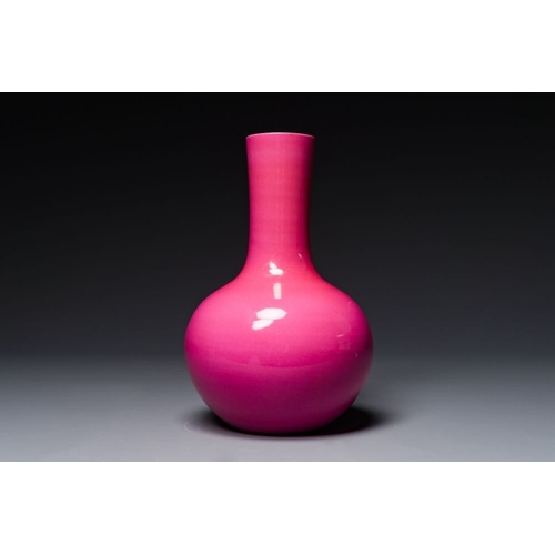 170 - A Chinese monochrome ruby-pink-glazed 'tianqiuping' vase on wooden stand, Yongzheng mark, 19/20th C.... 