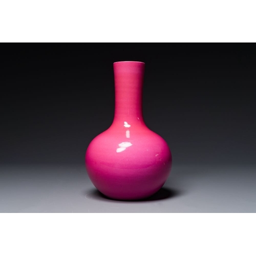 170 - A Chinese monochrome ruby-pink-glazed 'tianqiuping' vase on wooden stand, Yongzheng mark, 19/20th C.... 