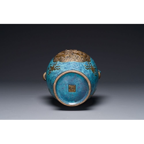 174 - A Chinese 'robin's egg and imitation bronze'-glazed 'hu' vase, Qianlong mark, 19th C.H.: 29 cm... 