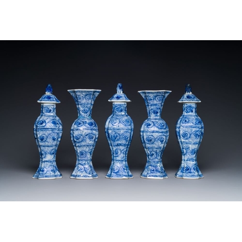 292 - A Chinese blue and white garniture of five vases with floral design, KangxiH.: 32 cm (the three vase... 