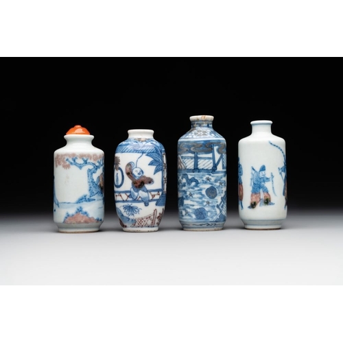 11 - Four Chinese blue, white and copper-red snuff bottles, Yongzheng and Daoguang mark, 19th C.H.: 8,1 c... 