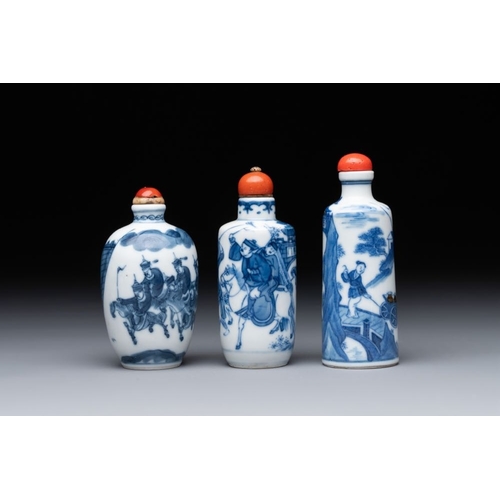 18 - Two Chinese blue and white snuff bottles and a blue, white and copper-red snuff bottle, Yongzheng ma... 