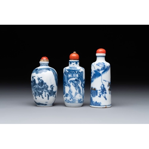 18 - Two Chinese blue and white snuff bottles and a blue, white and copper-red snuff bottle, Yongzheng ma... 