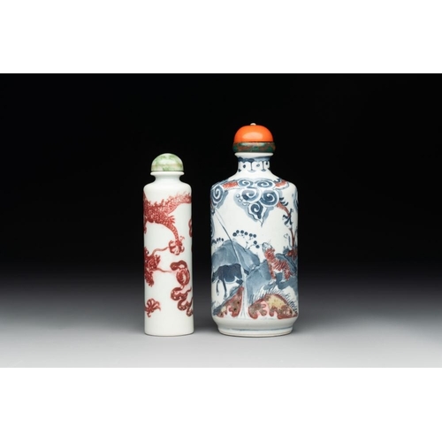 23 - A Chinese blue, white and copper-red snuff bottle with the zodiac and a copper-red 'dragon' snuff bo... 