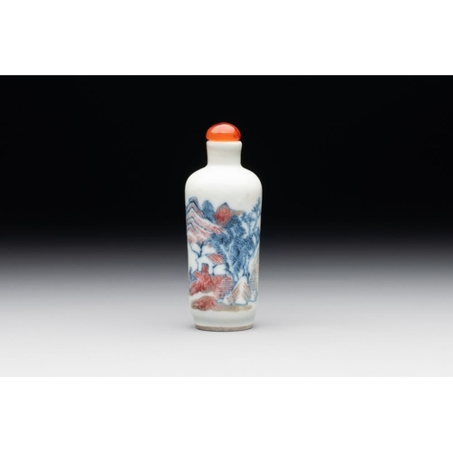 33 - A Chinese blue, white and copper-red 'landscape' snuff bottle, 19th C.H.: 8,3 cm (incl. stopper)The ... 