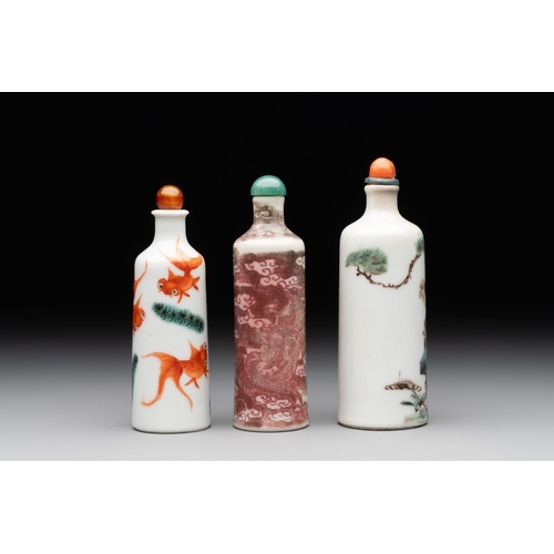 37 - A Chinese copper-red 'dragon' snuff bottle and two famille verte snuff bottles, Gu Yue Xuan and Daog... 