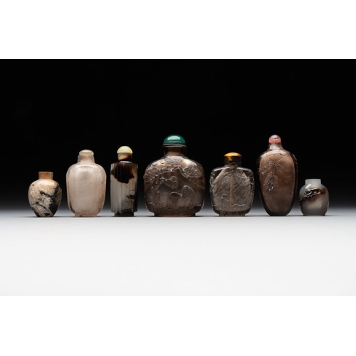 54 - Seven Chinese smoky quartz, agate and hardstone snuff bottles, 19/20th C.H.: 8,2 cm (the tallest inc... 