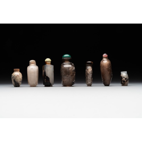 54 - Seven Chinese smoky quartz, agate and hardstone snuff bottles, 19/20th C.H.: 8,2 cm (the tallest inc... 