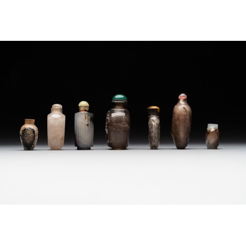 54 - Seven Chinese smoky quartz, agate and hardstone snuff bottles, 19/20th C.H.: 8,2 cm (the tallest inc... 