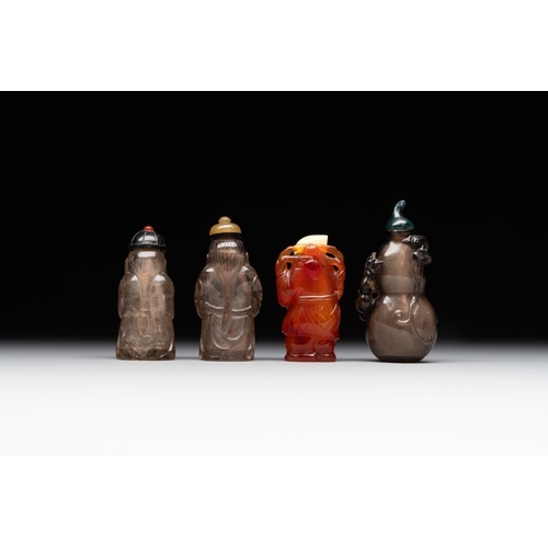 57 - Eight Chinese jade, glass, agate and smoky quartz snuff bottles, 19/20th C.H.: 7 cm (the tallest inc... 