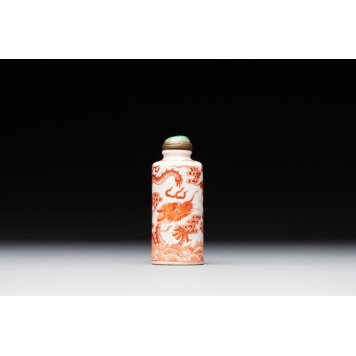 74 - A Chinese jade carving, a tortoiseshell card holder and an iron-red snuff bottle, 19th C.H.: 10,8 cm... 