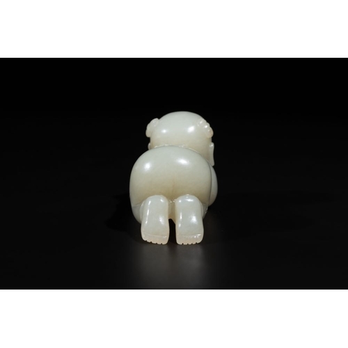 91 - A Chinese white jade carving of a reclining boy, QingDim.: 6,8 x 3,2 x 3,5 cm
 Weight.: 107 gramsThe... 