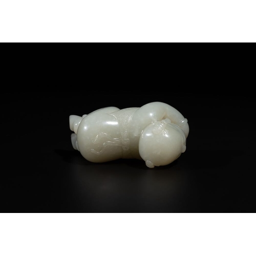 91 - A Chinese white jade carving of a reclining boy, QingDim.: 6,8 x 3,2 x 3,5 cm
 Weight.: 107 gramsThe... 