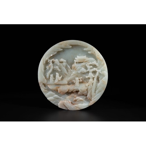 97 - A Chinese celadon and russet jade plaque with landscape design, 19th C.Dia.: 19,5 cmWeight.: 1175 gr... 