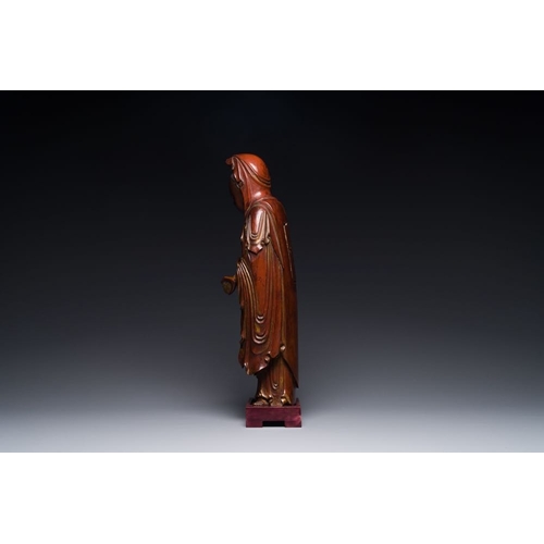 117 - A Chinese partly gilt and lacquered wooden sculpture of Guanyin, MingH.: 37 cm (incl. stand)The abse... 