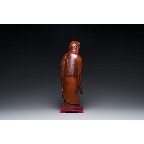 117 - A Chinese partly gilt and lacquered wooden sculpture of Guanyin, MingH.: 37 cm (incl. stand)The abse... 