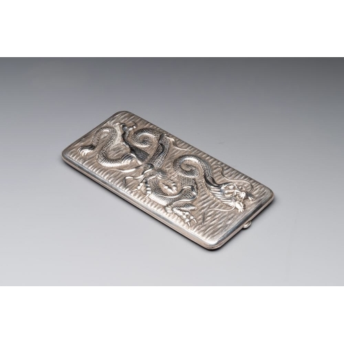 129 - A Chinese silver 'dragon' box and a tobacco box, Sheng chang mark, 19th C.Dim.: 15,5 x 10 x 7 cm (th... 