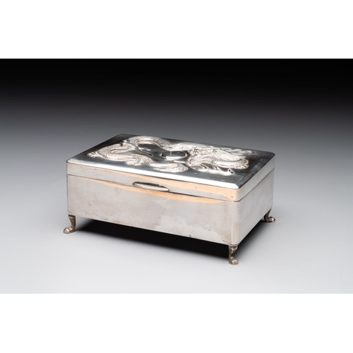 129 - A Chinese silver 'dragon' box and a tobacco box, Sheng chang mark, 19th C.Dim.: 15,5 x 10 x 7 cm (th... 