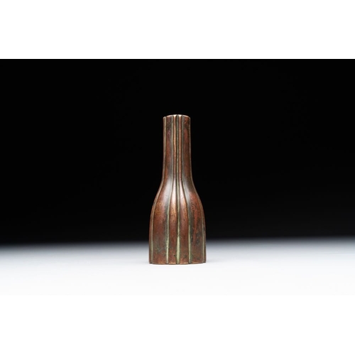 138 - A rare Chinese ribbed bronze flower arranging vase, MingH.: 12 cm
 Weight: 343 gramsThe absence of a... 