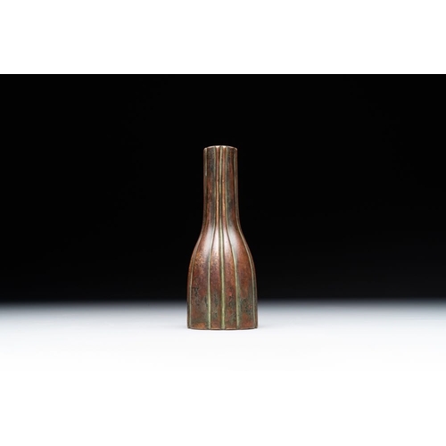 138 - A rare Chinese ribbed bronze flower arranging vase, MingH.: 12 cm
 Weight: 343 gramsThe absence of a... 