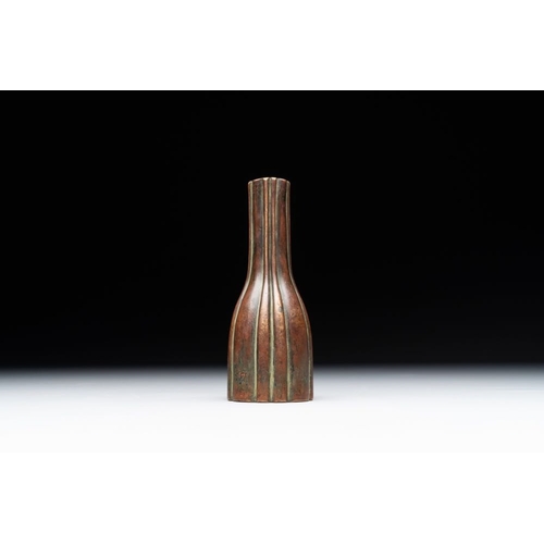 138 - A rare Chinese ribbed bronze flower arranging vase, MingH.: 12 cm
 Weight: 343 gramsThe absence of a... 