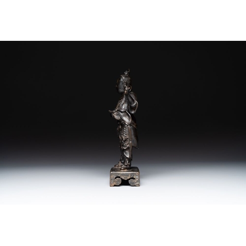 143 - A fine Chinese bronze figure of a divinity, MingH.: 31 cm Weight: 2127 grams The absence of a condit... 