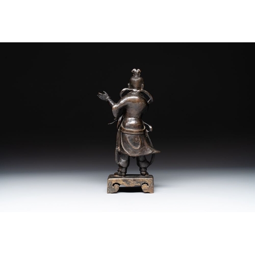 143 - A fine Chinese bronze figure of a divinity, MingH.: 31 cm Weight: 2127 grams The absence of a condit... 