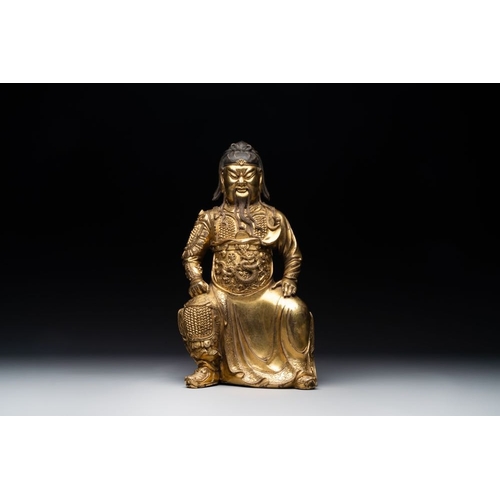 144 - An extremely rare Chinese gilt bronze figure of Guandi, MingH.: 37,8 cm (incl. stand)H.: 33,6 cm (ex... 