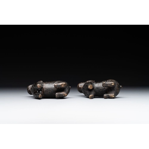 149 - A pair of Chinese bronze mythical creatures and two ewers, MingH.: 11 cm (the 'lotus' ewer)H.: 11,8 ... 