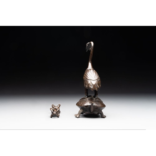 150 - A Chinese bronze candle or incense holder in the shape of a crane standing on a turtle and a Tibetan... 