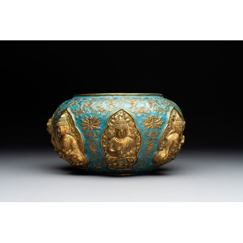 154 - A Chinese gilt and champleve enamelled bronze bowl with Buddhas in relief, 19/20th C.L.: 22 cm - H.:... 