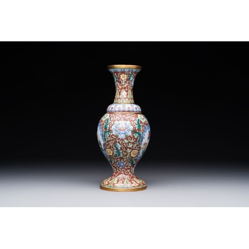 161 - A Chinese Beijing enamel vase with floral design, 19/20th C.H.: 28 cm The absence of a condition rep... 