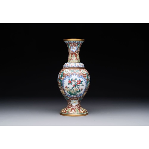 161 - A Chinese Beijing enamel vase with floral design, 19/20th C.H.: 28 cm The absence of a condition rep... 