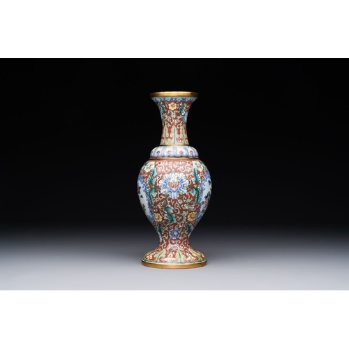 161 - A Chinese Beijing enamel vase with floral design, 19/20th C.H.: 28 cm The absence of a condition rep... 