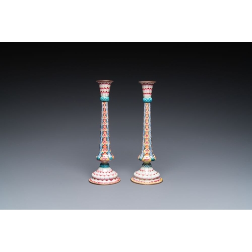 163 - A pair of Chinese Canton enamel 'lotus' candlesticks, YongzhengH.: 25 cmThe absence of a condition r... 