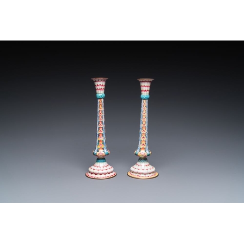 163 - A pair of Chinese Canton enamel 'lotus' candlesticks, YongzhengH.: 25 cmThe absence of a condition r... 