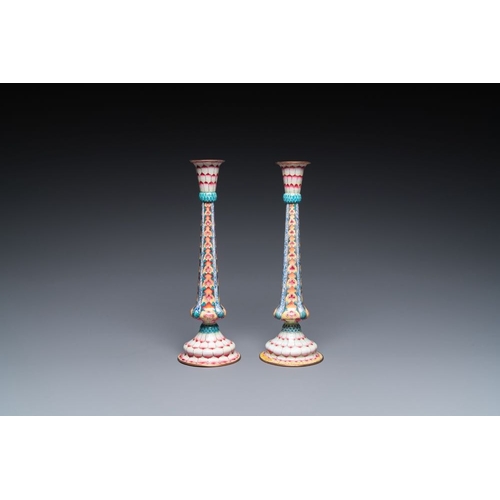 163 - A pair of Chinese Canton enamel 'lotus' candlesticks, YongzhengH.: 25 cmThe absence of a condition r... 