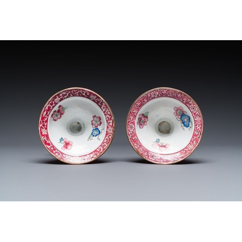 163 - A pair of Chinese Canton enamel 'lotus' candlesticks, YongzhengH.: 25 cmThe absence of a condition r... 