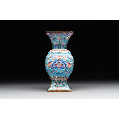 164 - A Chinese Canton enamel 'gu' vase with floral design, Qianlong mark and of the periodH.: 9 cmThe abs... 