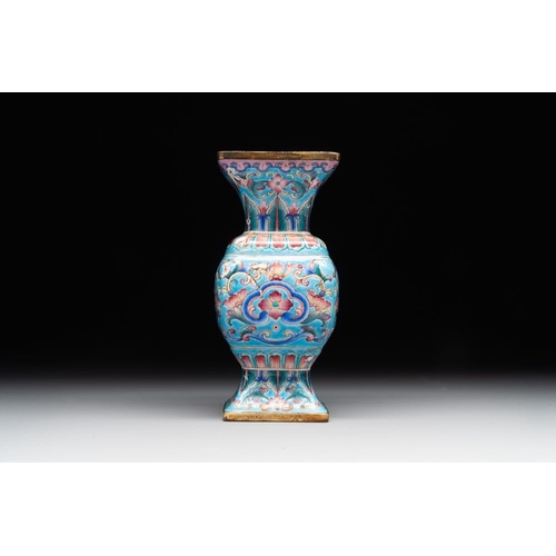 164 - A Chinese Canton enamel 'gu' vase with floral design, Qianlong mark and of the periodH.: 9 cmThe abs... 