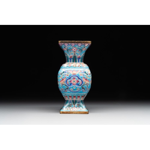 164 - A Chinese Canton enamel 'gu' vase with floral design, Qianlong mark and of the periodH.: 9 cmThe abs... 