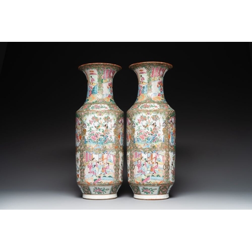 186 - A pair of Chinese Canton famille rose vases with figures, flowers and insects, 19th C.H.: 62,5 cmThe... 